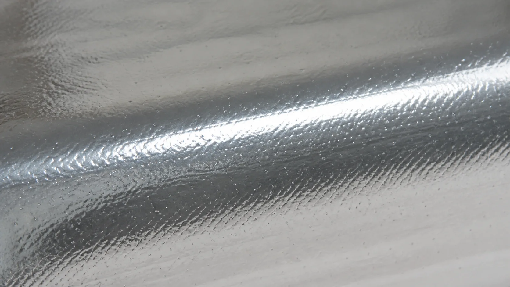 Reflective foil insulation material